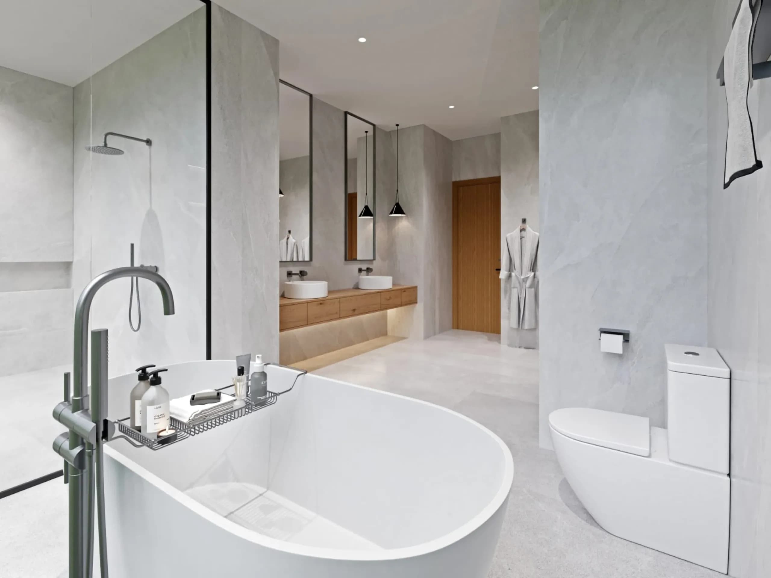 Master bathroom with freestanding tub and twin oak vanity